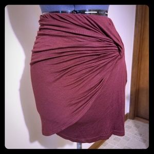 Burgundy stretch wrap asymetrical skirt